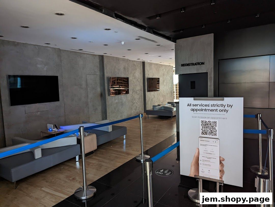 Interior of a Samsung Service Centre with waiting area and registration desk.