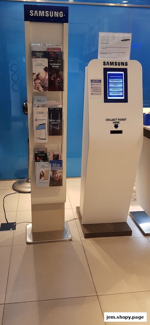 Samsung Service Centre with a brochure stand and a ticket collection kiosk.