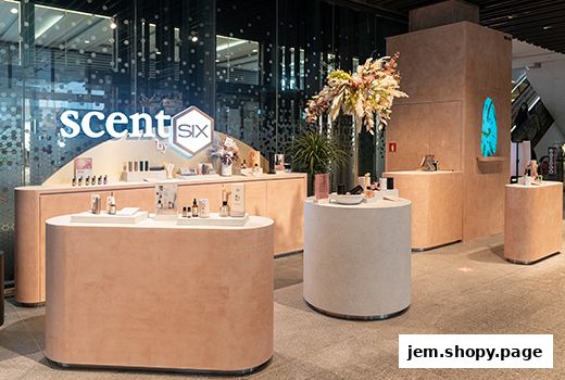 Interior view of Scent by SIX Jem, showcasing perfume bottles and displays.