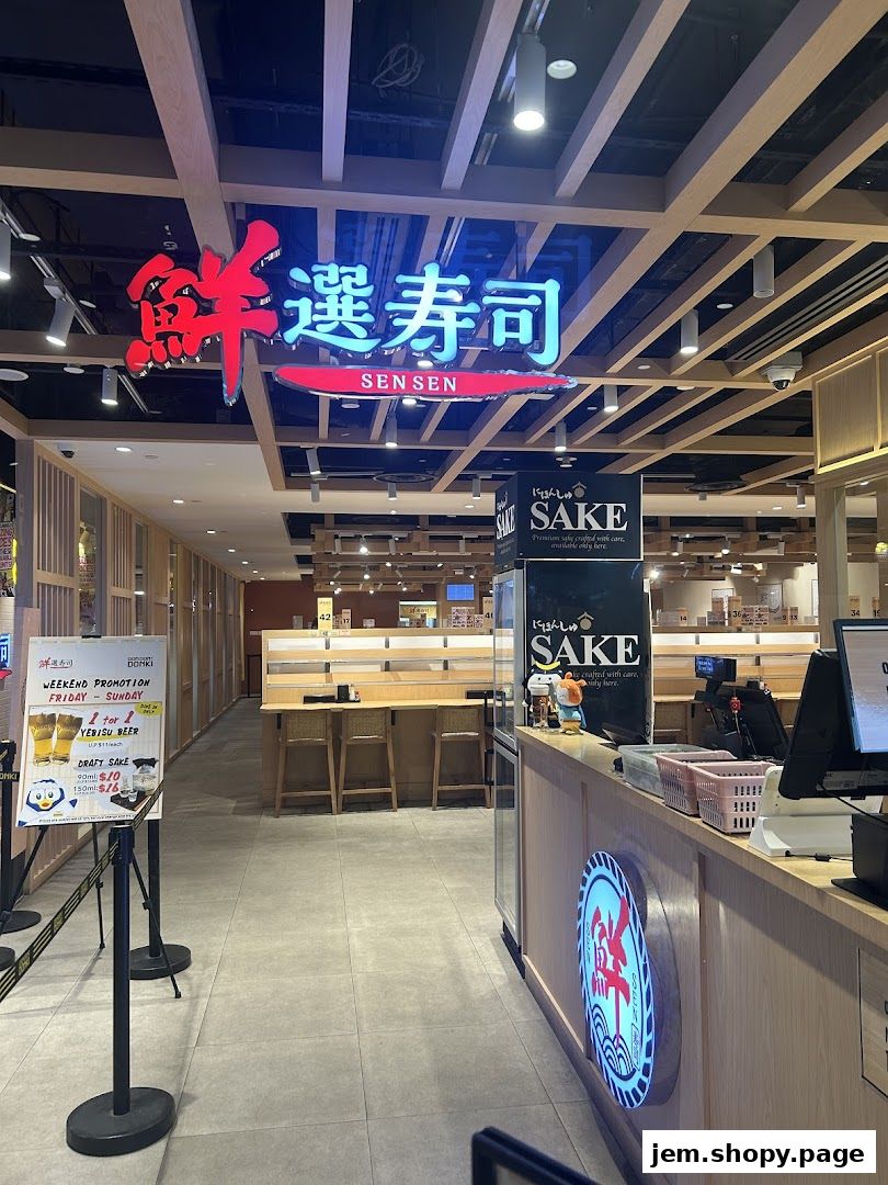 Interior view of Sen Sen Sushi Jem by DON DON DONKI, showcasing seating and a counter.