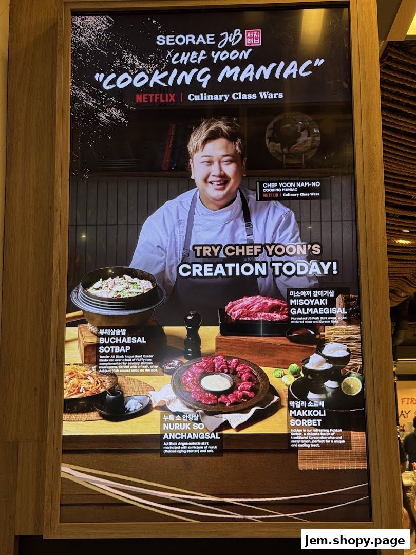 A promotional display for Chef Yoon's 'Cooking Maniac' dishes, featuring various Korean food items.