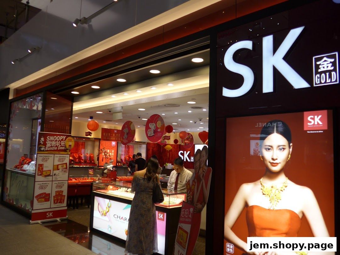 SK Jewellery store entrance with displays of gold jewelry and promotional posters.
