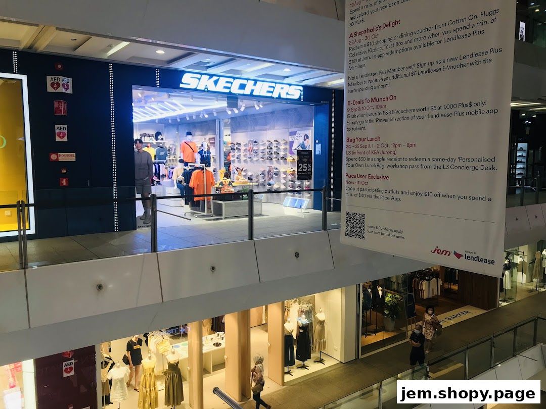 The Skechers store entrance with mannequins and shoes displayed inside.
