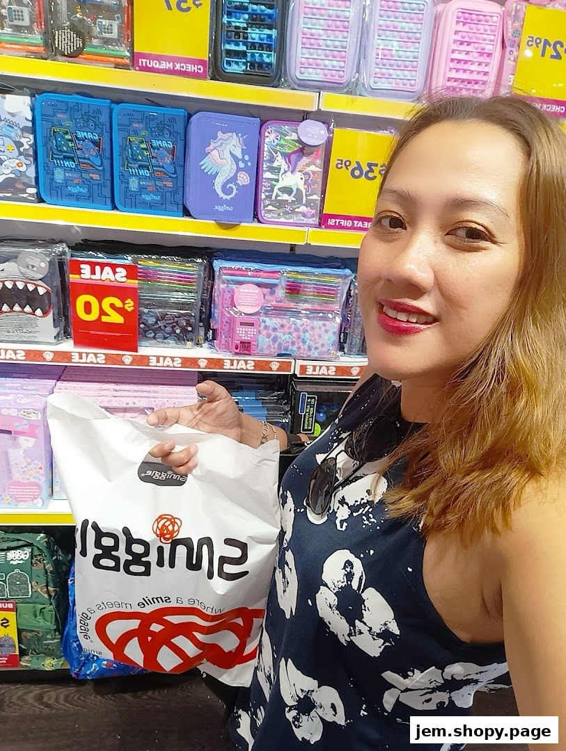A woman holds a Smiggle shopping bag in front of shelves stocked with colorful stationery and accessories.
