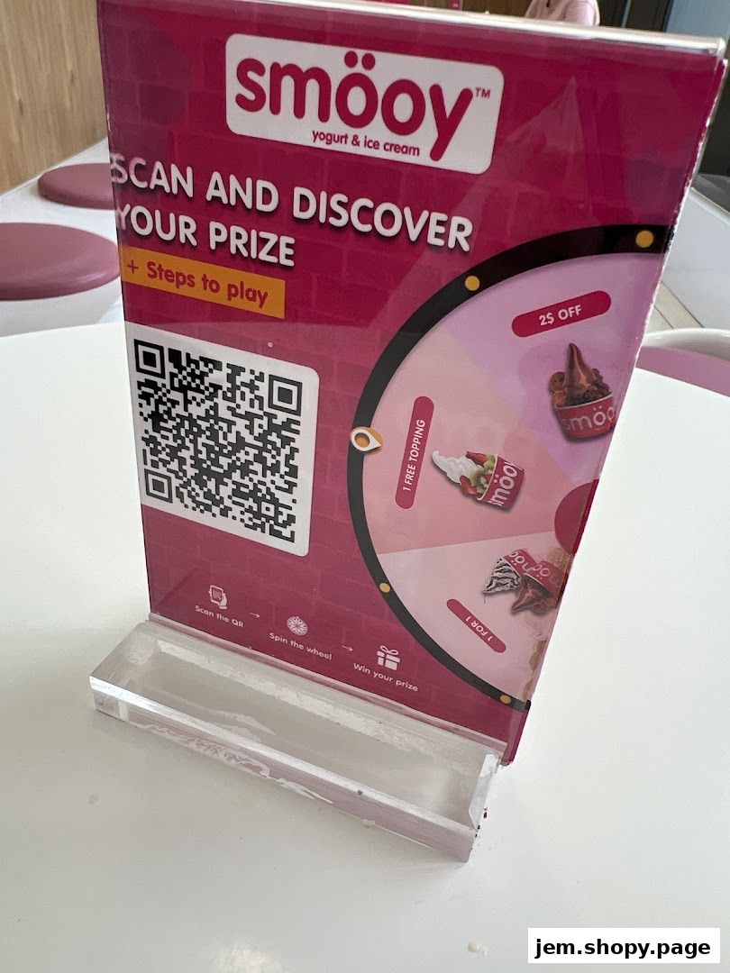 A promotional stand for Smooy yogurt and ice cream, featuring a QR code and prize wheel.