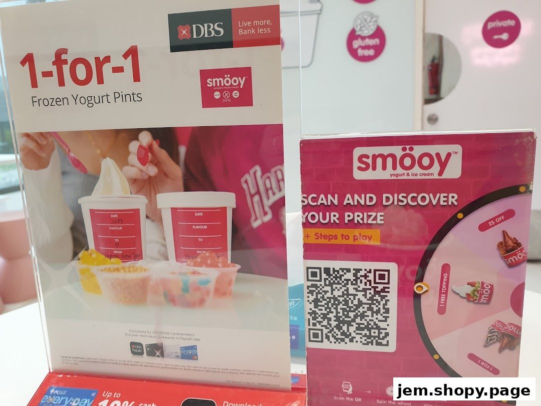 Promotional displays for Smooy yogurt and ice cream, featuring a 1-for-1 offer and a prize-winning game.