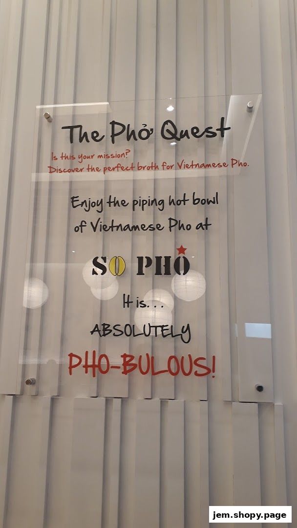 A sign for 'So Pho' restaurant with a playful slogan about Vietnamese Pho.