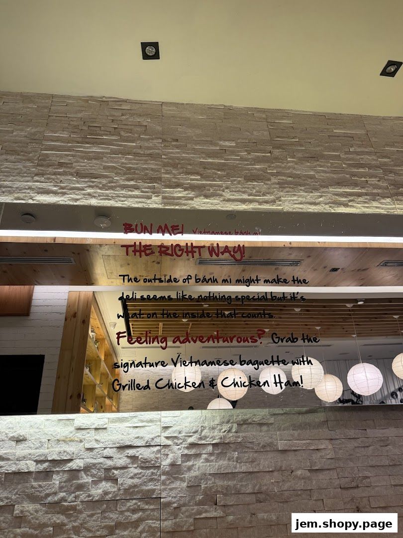 A sign advertises Vietnamese banh mi, highlighting grilled chicken and chicken ham.