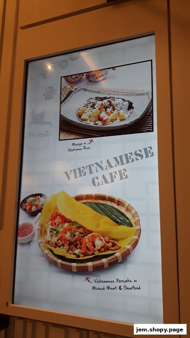 A digital menu board displaying Vietnamese dishes like mango sticky rice and Vietnamese pancakes.