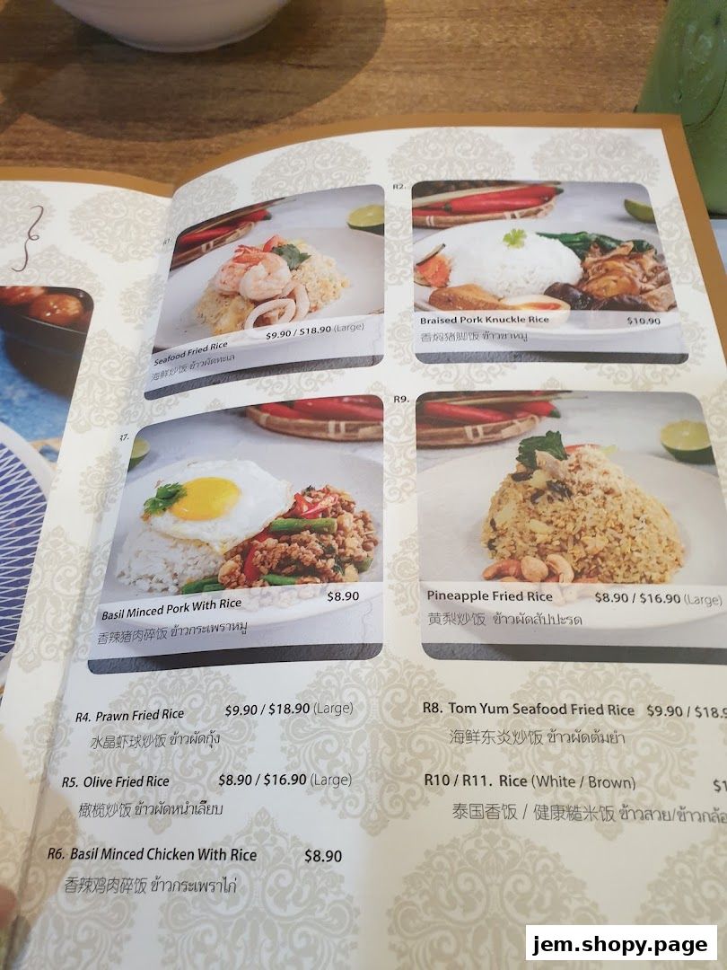 A menu page from Soi Thai Soi Nice featuring various rice dishes with images and prices.