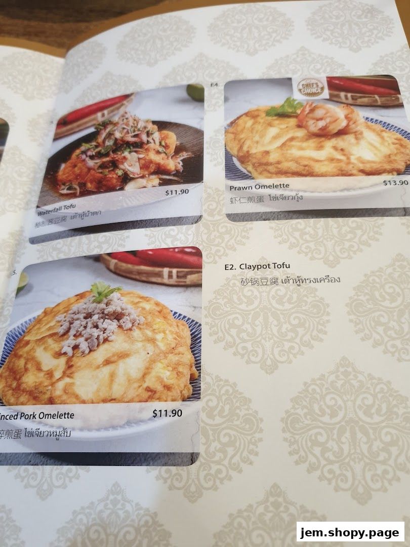 A menu page from Soi Thai Soi Nice JEM featuring Thai dishes like tofu and omelettes.