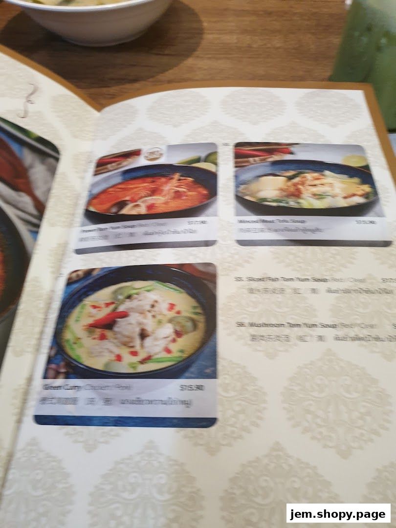 A menu page from Soi Thai Soi Nice JEM featuring Thai dishes with images and prices.