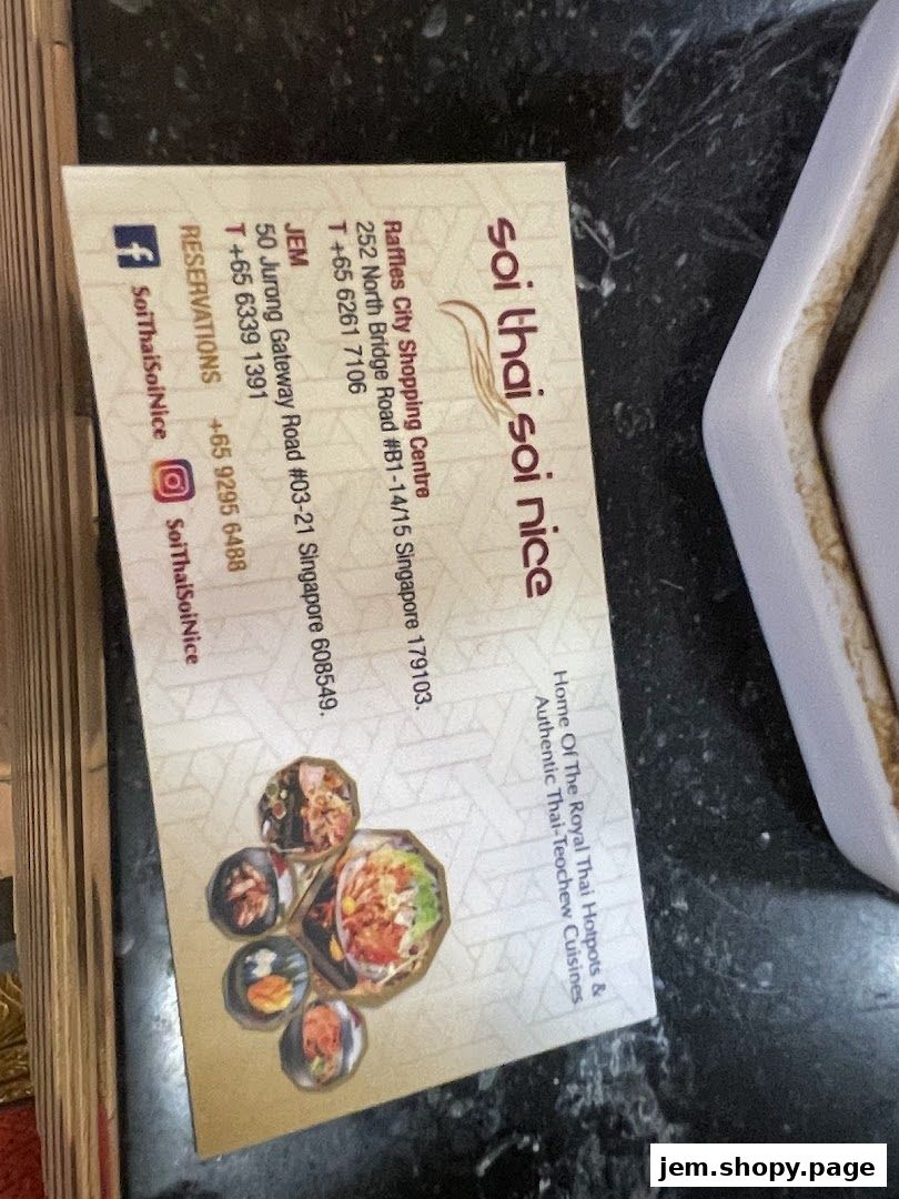 A business card for Soi Thai Soi Nice restaurant, featuring contact details and locations.