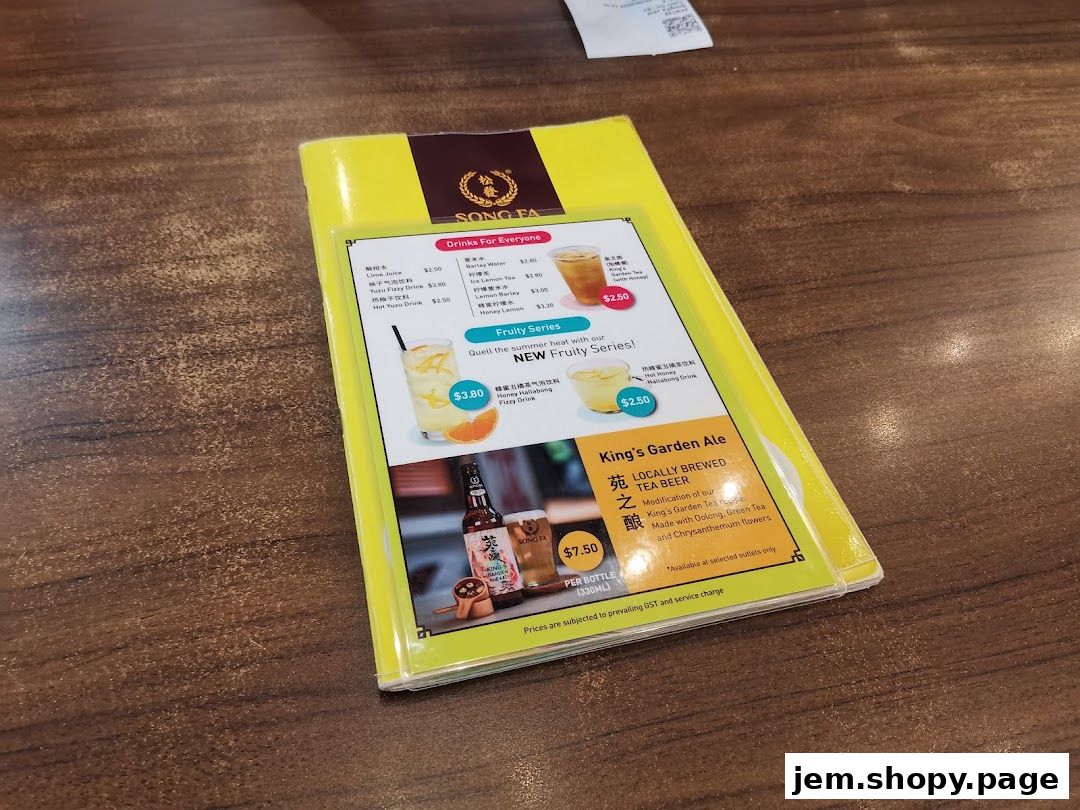 A menu from Song Fa Bak Kut Teh featuring drinks and a special tea beer.