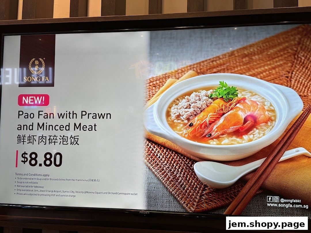 A digital menu displays a new Pao Fan dish with prawns and minced meat for $8.80.