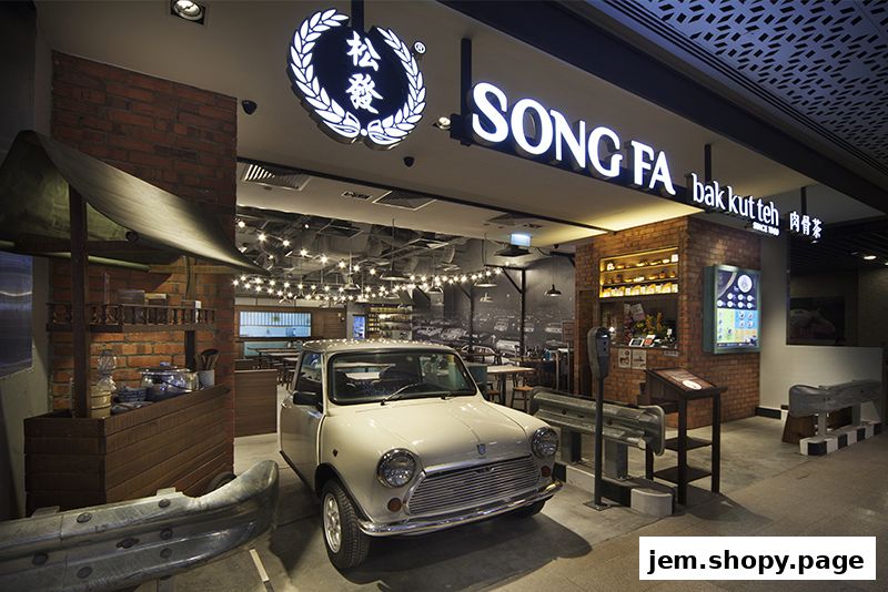 The exterior of Song Fa Bak Kut Teh JEM, featuring a vintage car and rustic decor.