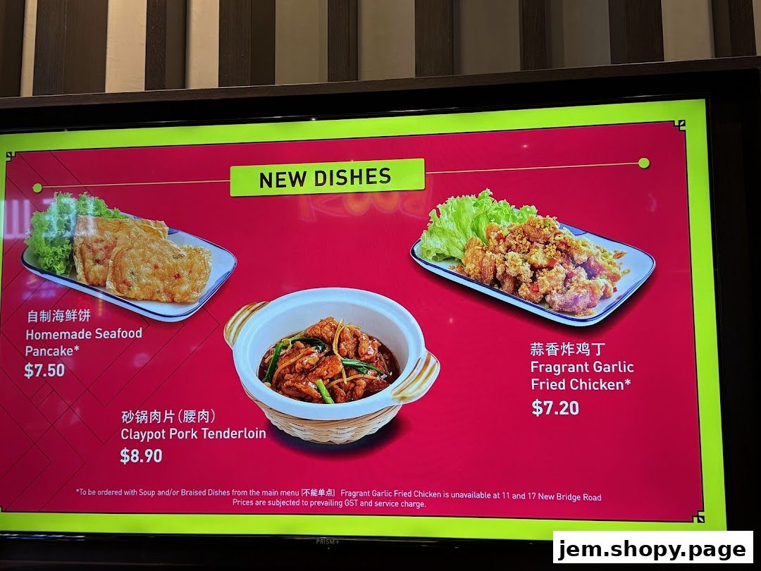A digital menu board displaying new dishes from Song Fa Bak Kut Teh.