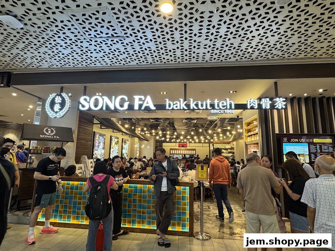 People queuing outside Song Fa Bak Kut Teh, a popular restaurant with a distinctive facade.