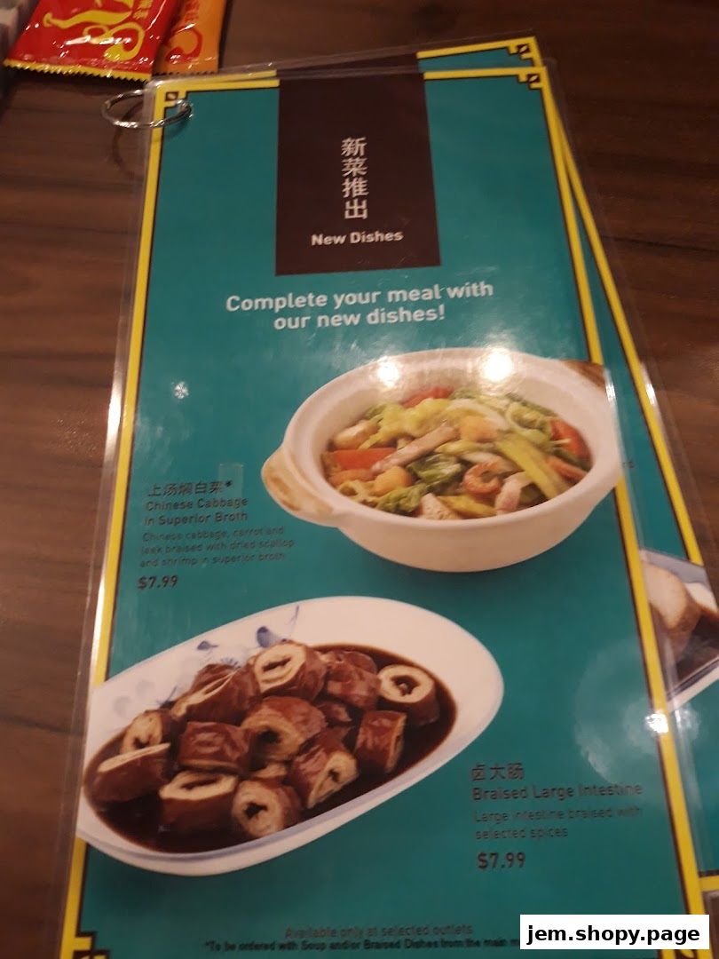 A menu showcasing new dishes from Song Fa Bak Kut Teh, featuring braised large intestine and Chinese cabbage.