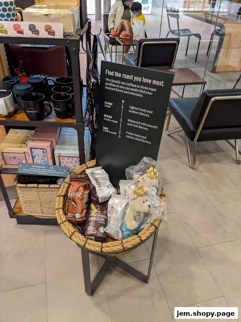 Starbucks coffee bags and merchandise displayed in a basket and on shelves.