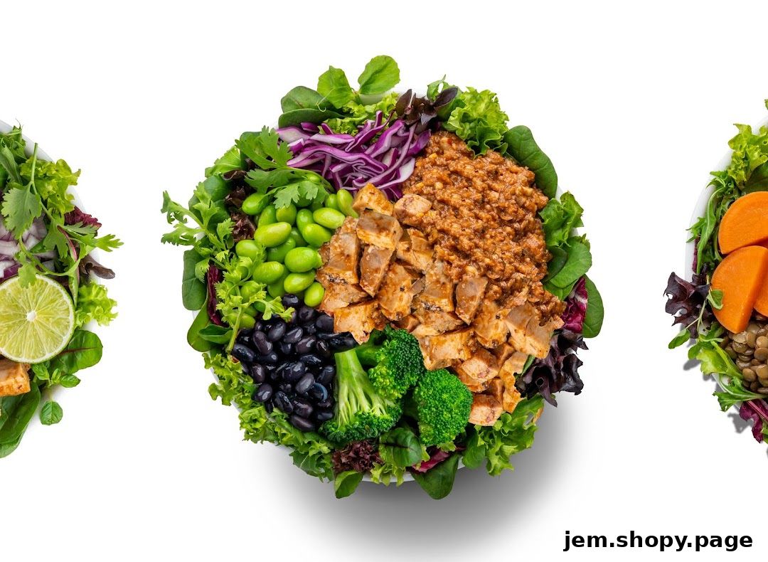 A close-up overhead view of three vibrant and healthy salad bowls filled with fresh ingredients.