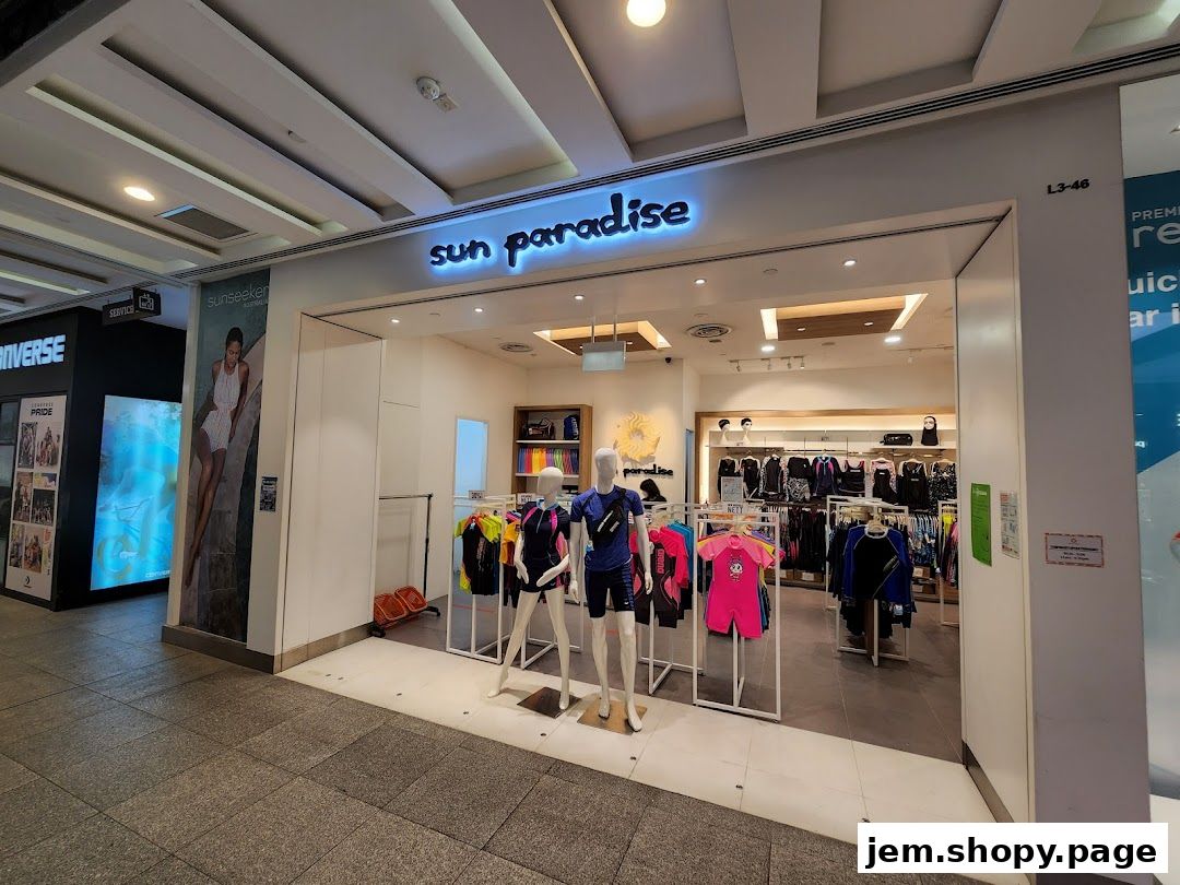 The Sun Paradise shop displays swimwear and accessories on mannequins and racks.