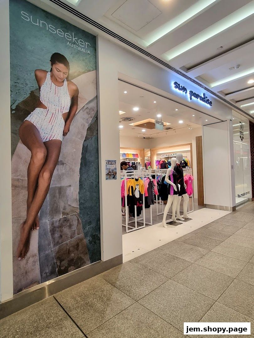 The exterior of the Sun Paradise shop, featuring swimwear and a large advertisement.
