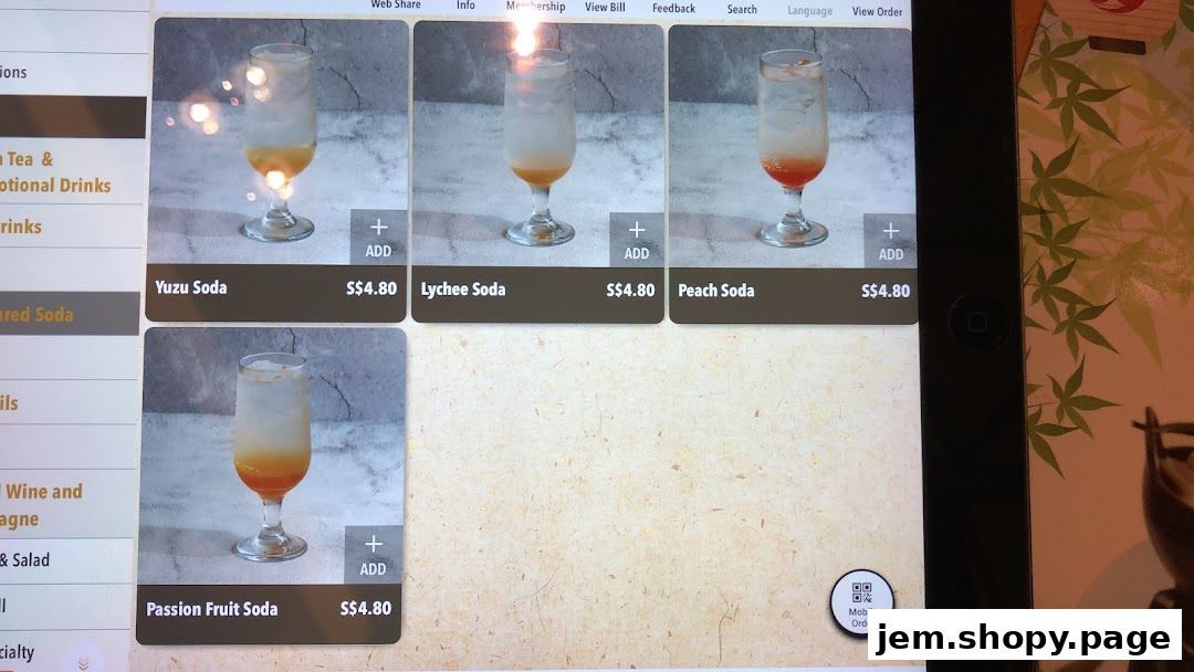 A digital menu displaying various soda drinks with images and prices.