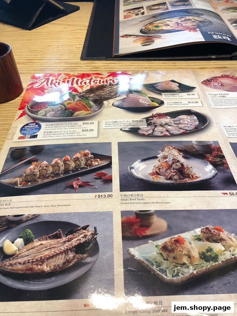 A menu from Sushi Tei featuring various sushi and sashimi dishes with prices.