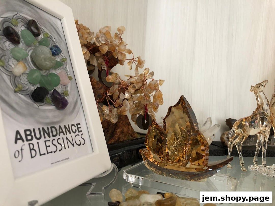 A framed artwork with crystals and a crystal tree, alongside decorative crystal figurines.