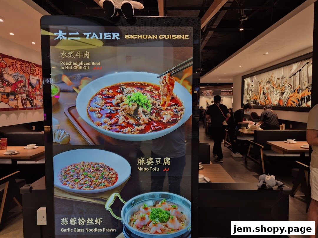 A digital menu board displays Sichuan cuisine dishes like Poached Sliced Beef and Mapo Tofu.