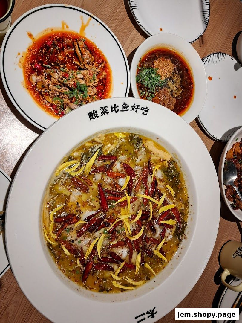 A spread of delicious Chinese dishes, featuring fish and other flavorful ingredients.