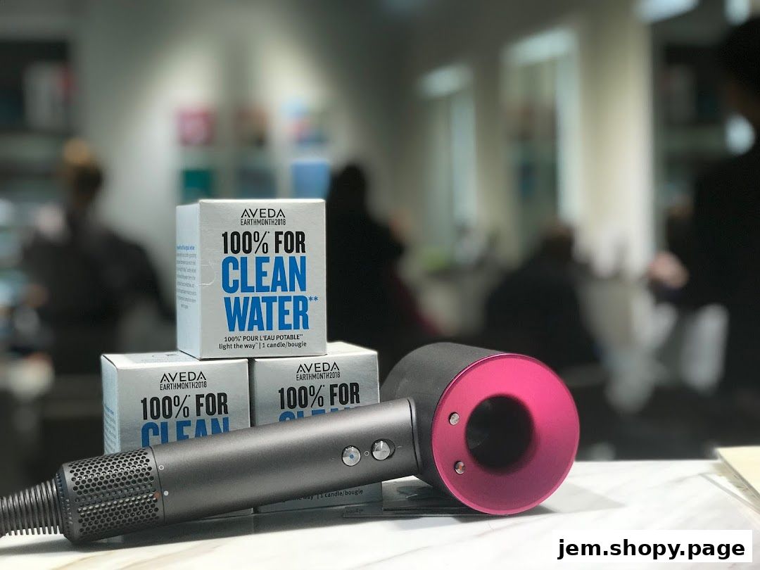 A Dyson hairdryer and Aveda Earth Month candles are displayed on a counter.