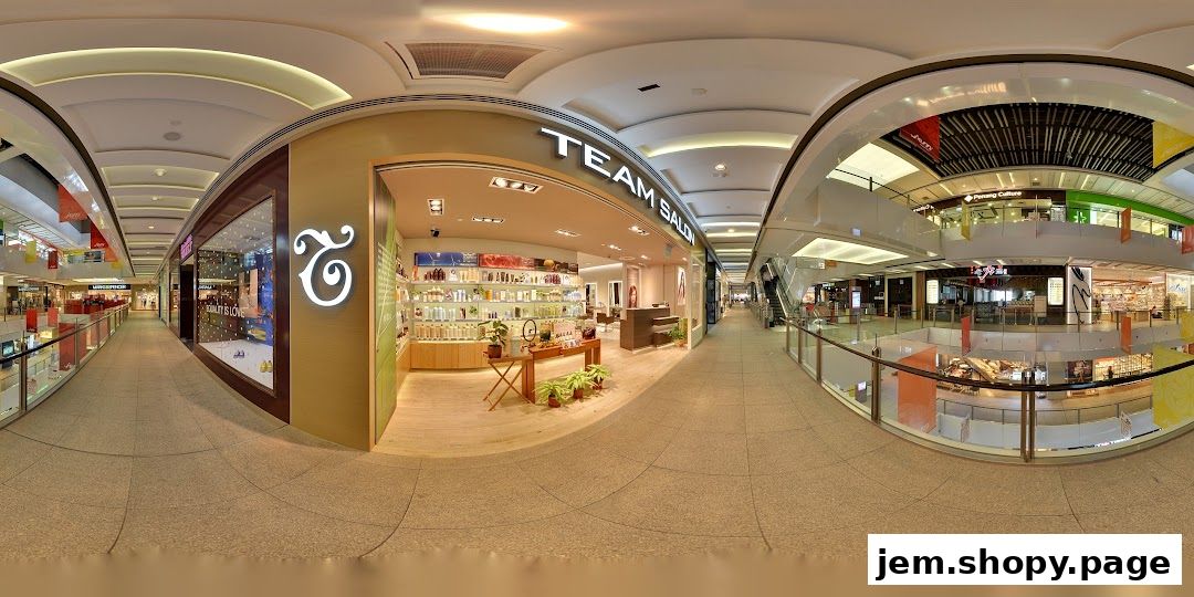 Interior view of Team Salon Jem Aveda, showcasing products and salon reception area.