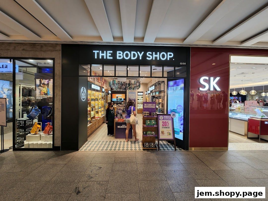 The Body Shop storefront with products displayed inside and promotional signage.
