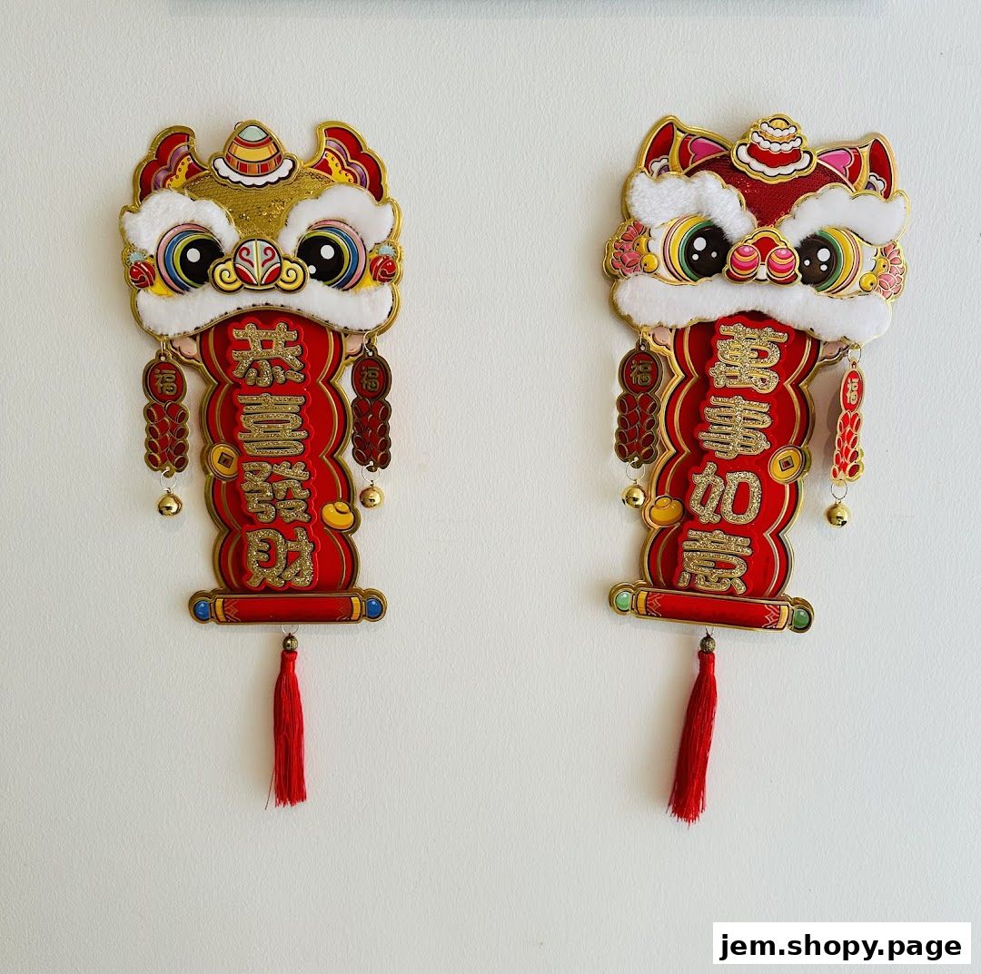 Two festive Chinese New Year lion head decorations with auspicious calligraphy.