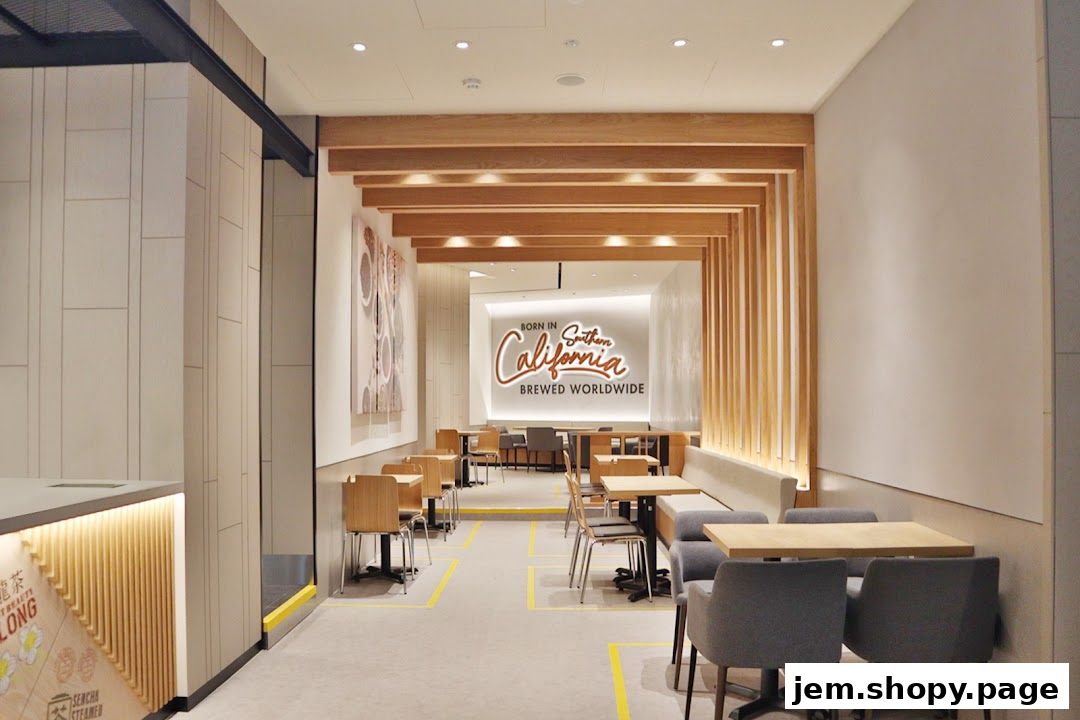Interior of The Coffee Bean Tea Leaf shop with seating areas and branding.