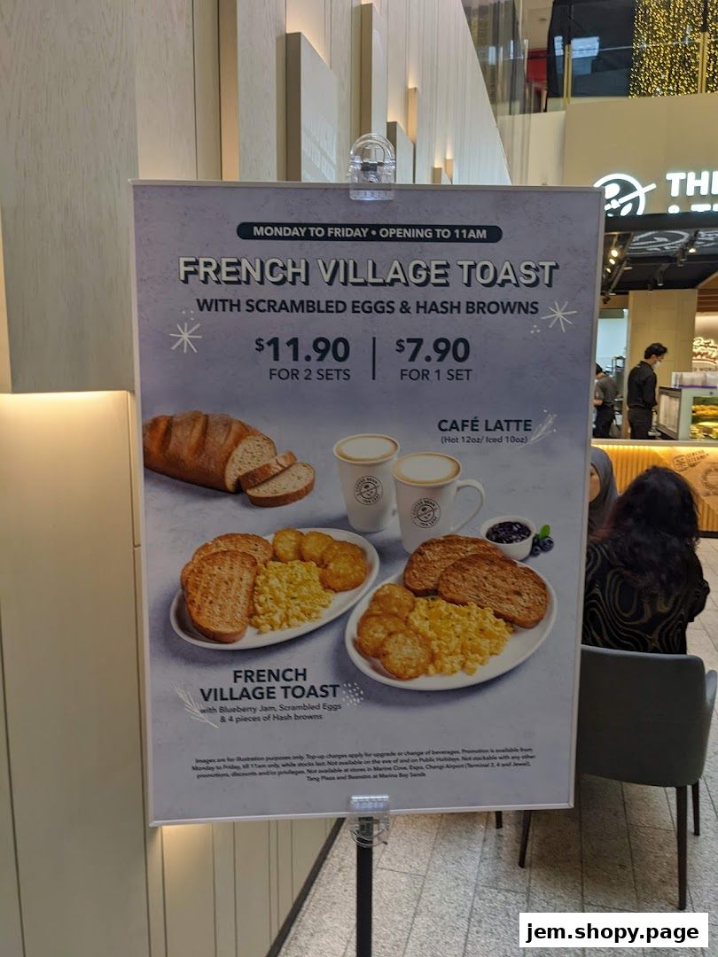 A promotional sign for French Village Toast with scrambled eggs and hash browns.