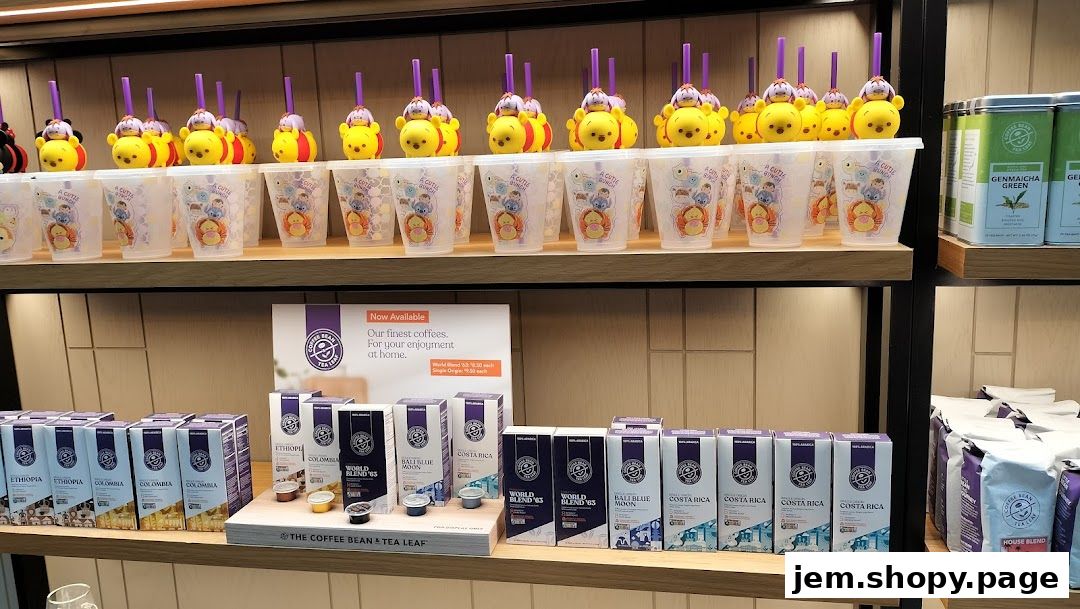 Shelves display coffee products, branded cups, and tea tins at The Coffee Bean & Tea Leaf.