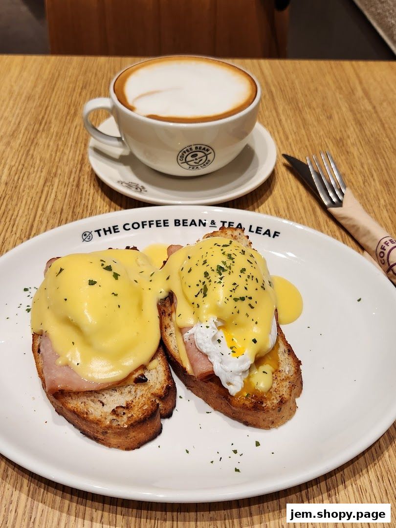 A delicious breakfast of Eggs Benedict and a latte at The Coffee Bean & Tea Leaf.