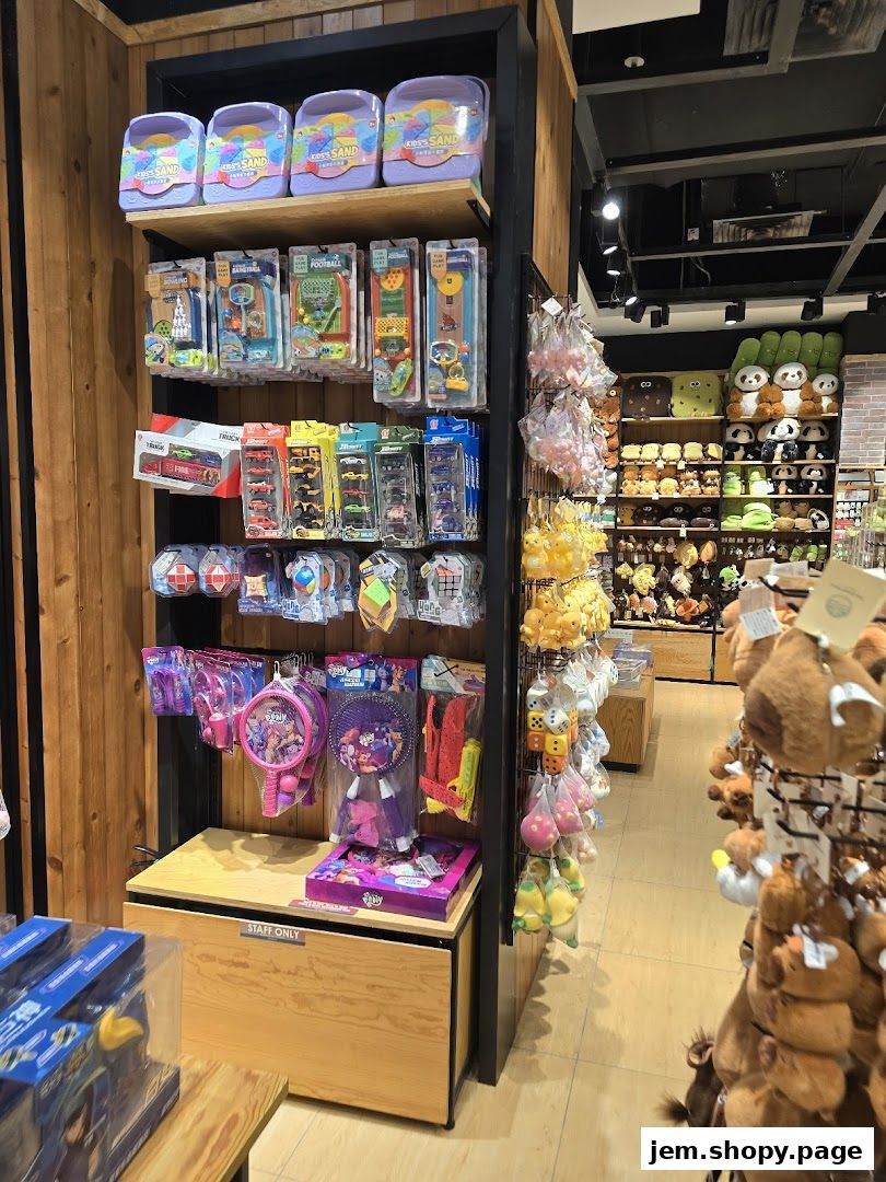 A retail store interior displaying a variety of toys and plush items on shelves and racks.