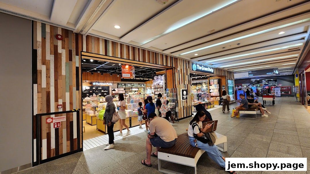 The Green Party shop entrance with customers browsing inside and outside.