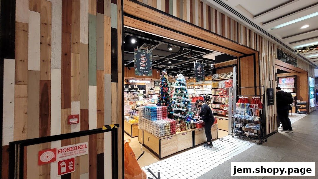 The Green Party shop entrance with Christmas trees and festive decorations on display.
