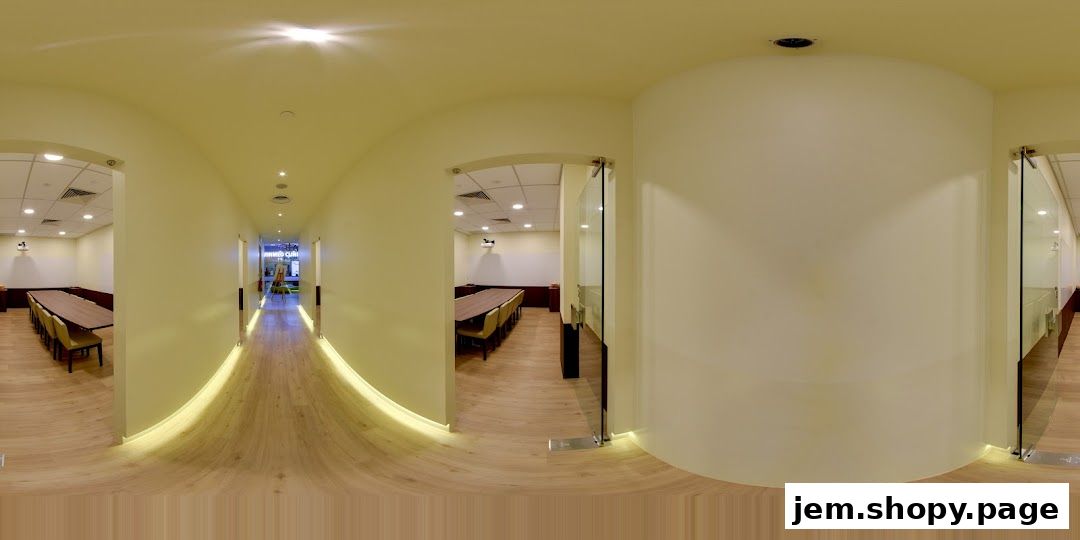 Interior view of a modern learning center with classrooms and a long hallway.