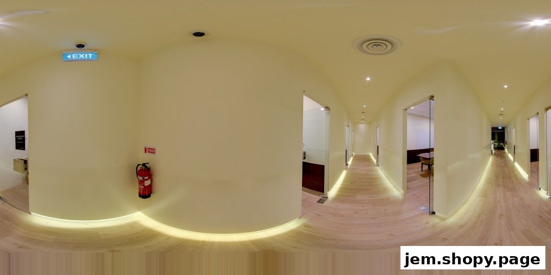Interior hallway of The Learning Lab JEM with classrooms and an exit sign.