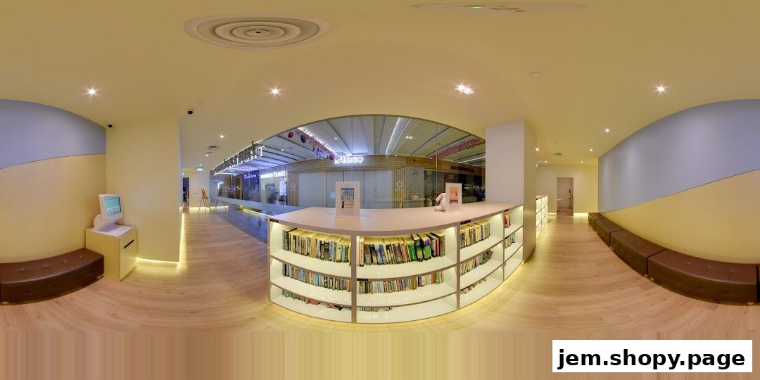Interior view of The Learning Lab JEM, featuring a reception desk with books and seating.