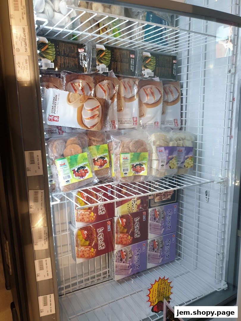A freezer display filled with various frozen seafood products and snacks.