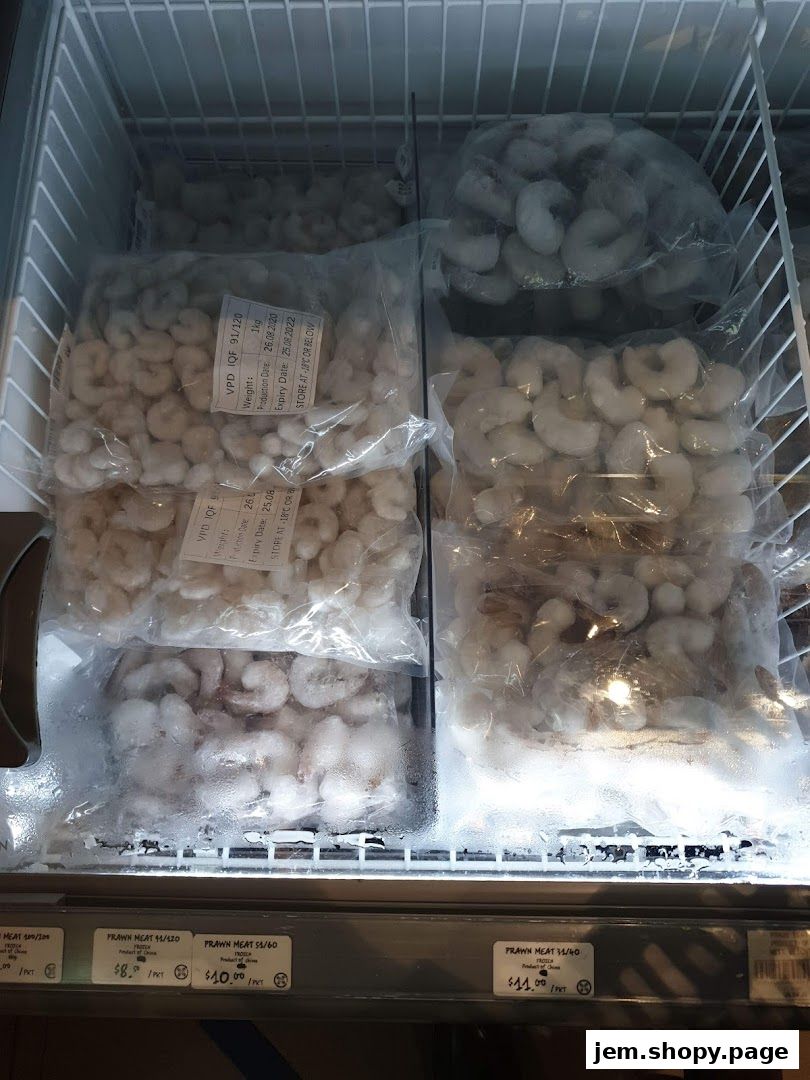 Frozen prawns displayed in a freezer at The Seafood Market Place By Song Fish.