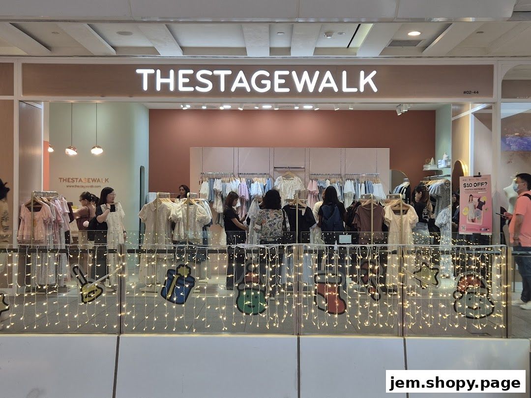 The Stage Walk clothing store entrance with mannequins and clothing racks visible.