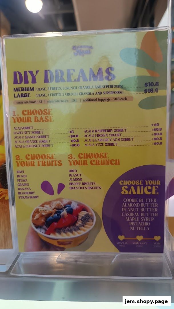 A menu board for 'The Summer Açaí' featuring DIY dreams açaí bowls with customizable bases, fruits, crunch, and sauces.